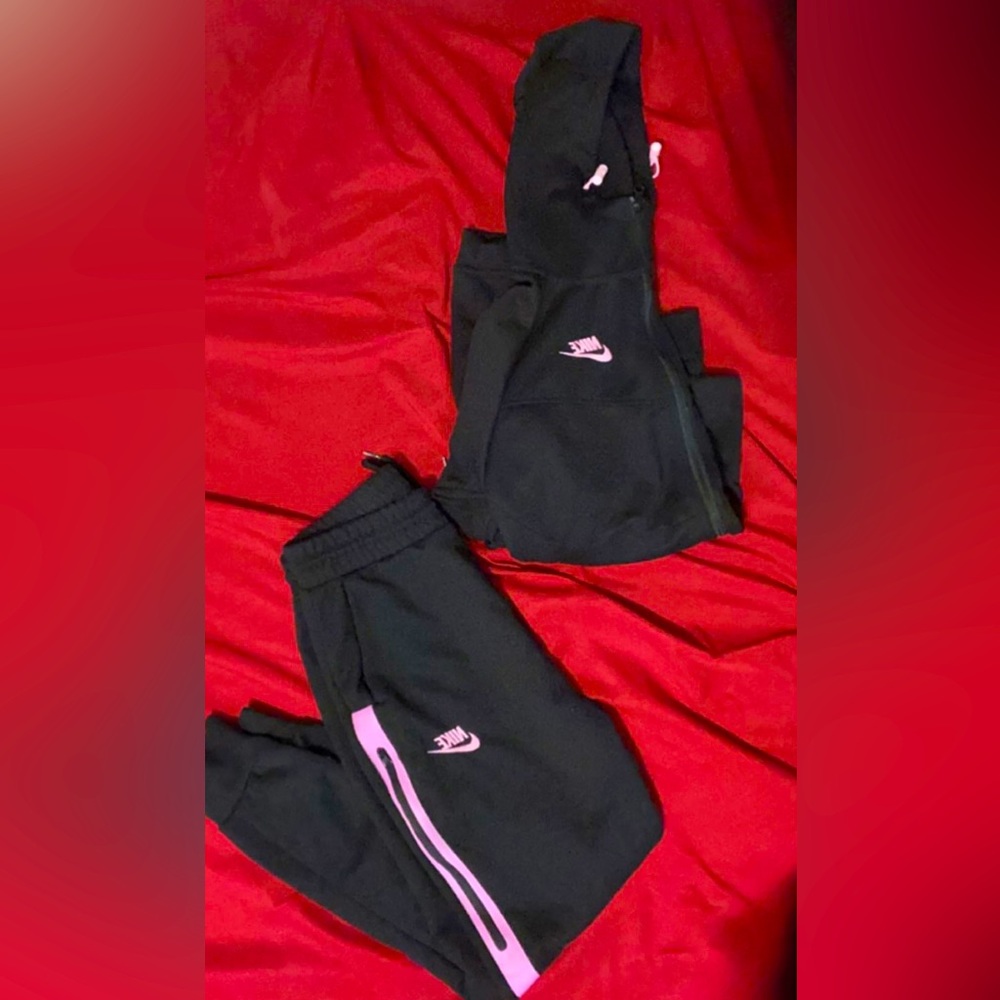 Women’s pink & black zip up jacket with matching joggers. Size XS.